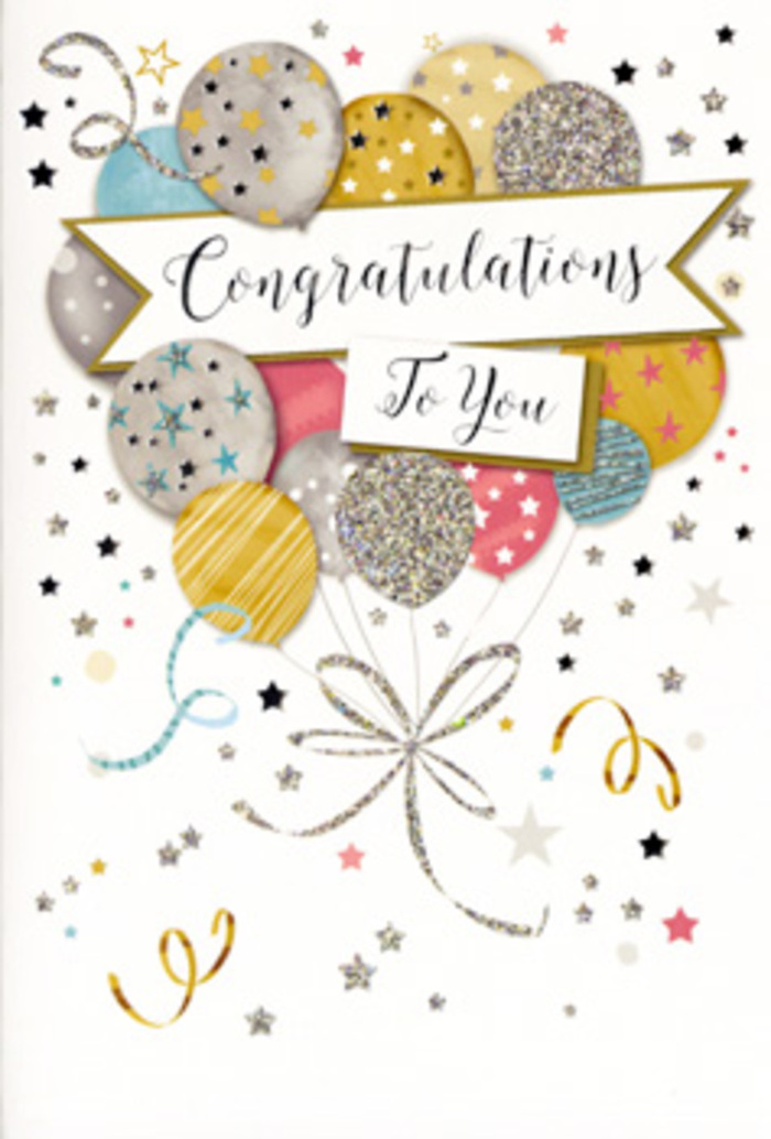 The image shows a refined congratulations card that captures the mood of a surprise party, the kind you might host in a cosy Crofton Park home after a promotion or graduation. Dominating the design is a lush cluster of illustrated balloons, layered to create depth and fullness, as if they're pressing gently against one another in mid-air. Their colours are soft yet celebratory: muted gold, polished silver, champagne beige, soft sky blue, blush pink, and a subdued grey, all harmonising to create an elegant, modern palette. Each balloon carries its own decorative details-tiny sprinkled stars, delicate glittery bands, and fine, shimmering dots-so no two look exactly alike. The surfaces suggest a subtle metallic sheen, as though catching warm, indoor light on a festive evening. From the base of the balloons, slender ribbons in gold and silver trail downward in loose curls, overlapping and looping together like ribbons tied around a bouquet of flowers from a Brockley Road florist. The background of the card is a clean, pale tone, scattered with small metallic stars, swirls, and curling lines that echo the movement of confetti tossed into the air or streamers unfurling in an instant of joy. Across the middle of the balloon arrangement, a soft banner stretches from side to side, gently arched and subtly shaded to suggest dimension. On this banner, the words Congratulations To You are written in ornate, classical script, the letters elegant and confident. The overall impression is one of quiet yet unmistakable celebration-perfect for honouring milestones, exam results, or a new chapter in life for someone in the Crofton Park community, when you want a card that feels as thoughtful and polished as the occasion itself.
